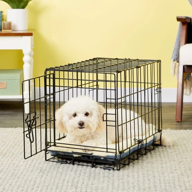 MidWest Quiet Time Fleece Reversible Dog Crate Mat, Blue Paw Print 4 MidWest Quiet Time Fleece Reversible Dog Crate Mat, Blue Paw Print - Image 4